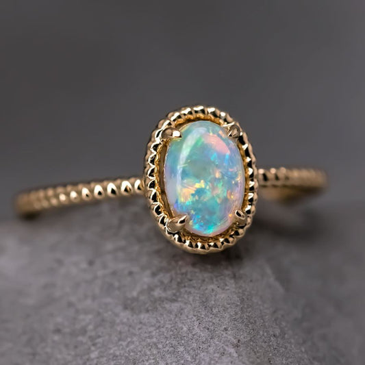 Twisted Band Oval Australian Solid Opal Ring in 14K Yellow Gold