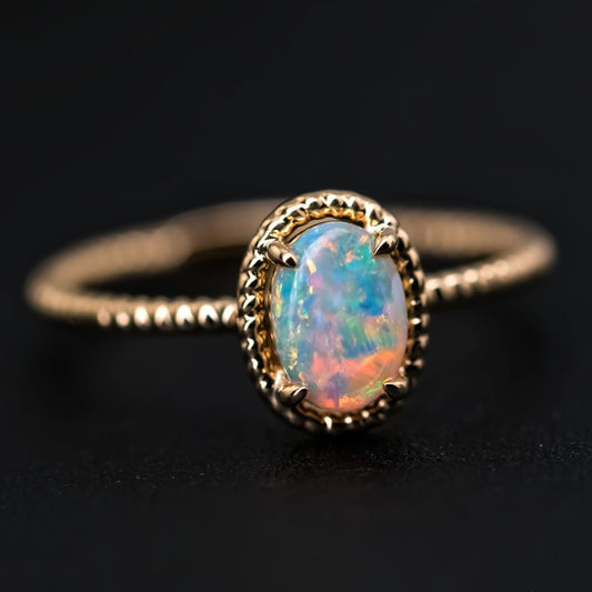 Twisted Band Oval Australian Solid Opal Ring in 14K Yellow Gold