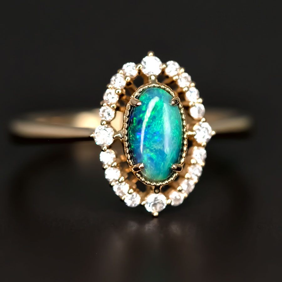 Engagement Ring: Australian Black Opal and Diamond in 18K Yellow Gold