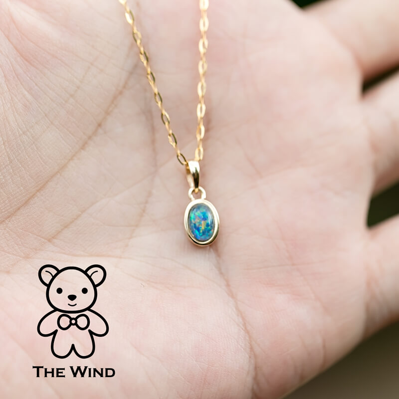 Oval Shaped Australian Triplet Opal Necklace in 14k Yellow Gold