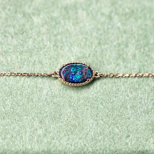 Oval Shaped Australian Boulder Opal Bracelet in 18K Yellow Gold