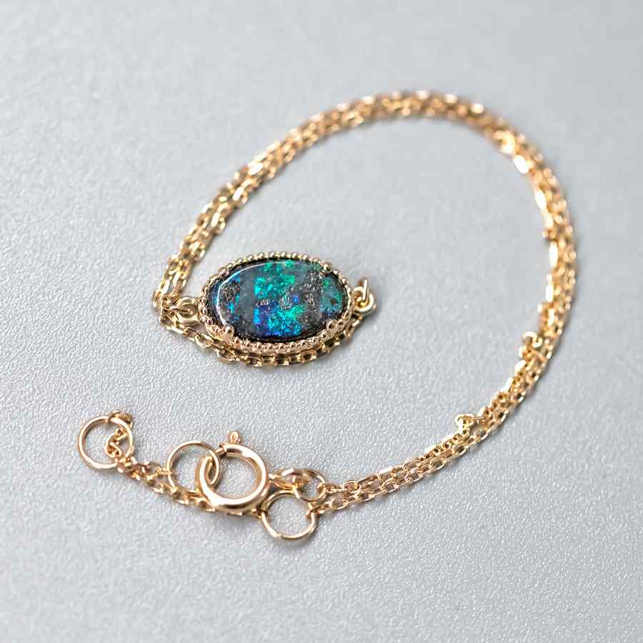 Oval Shaped Australian Boulder Opal Bracelet in 18K Yellow Gold