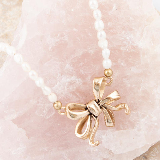 Gifted Freshwater White Pearl Golden Bow Pendant Necklace