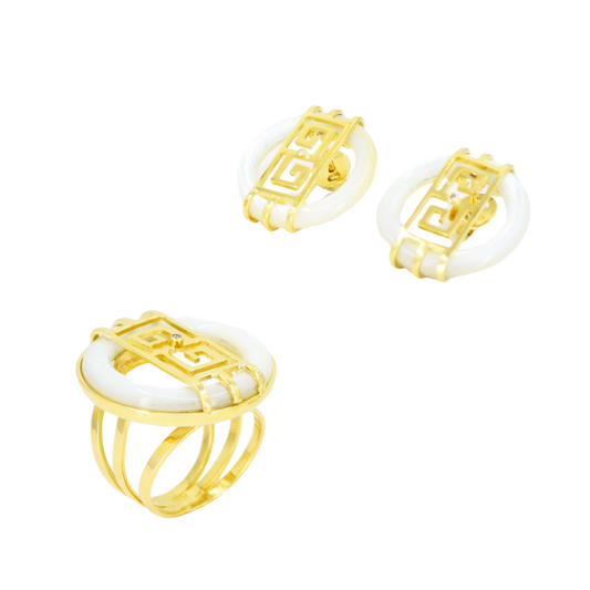 Set of white mother-of-pearl donuts with minimalist linear openwork superimposed in 18K yellow gold.; CHJ-30818