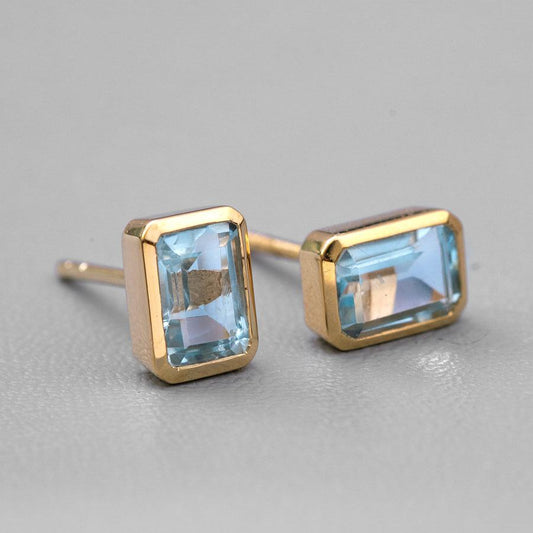 Blue Topaz Stud Earrings 14K Yellow Gold Emerald Cut