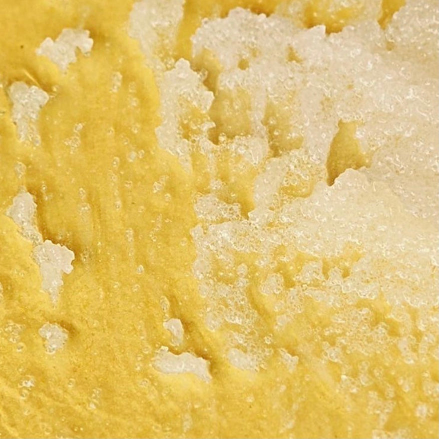 body scrub texture on yellow background