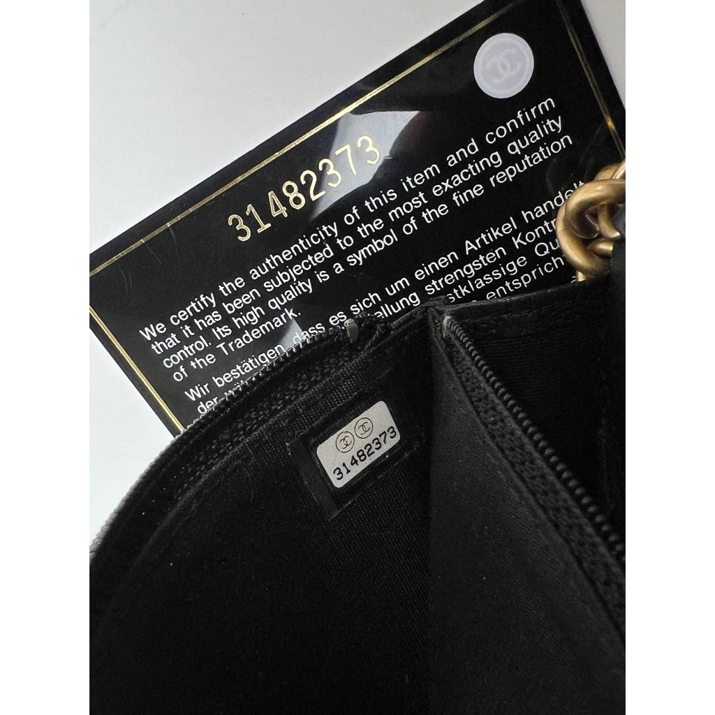 Chanel Caviar Quilted Mini Boy Clutch Wallet on a Chain Black
