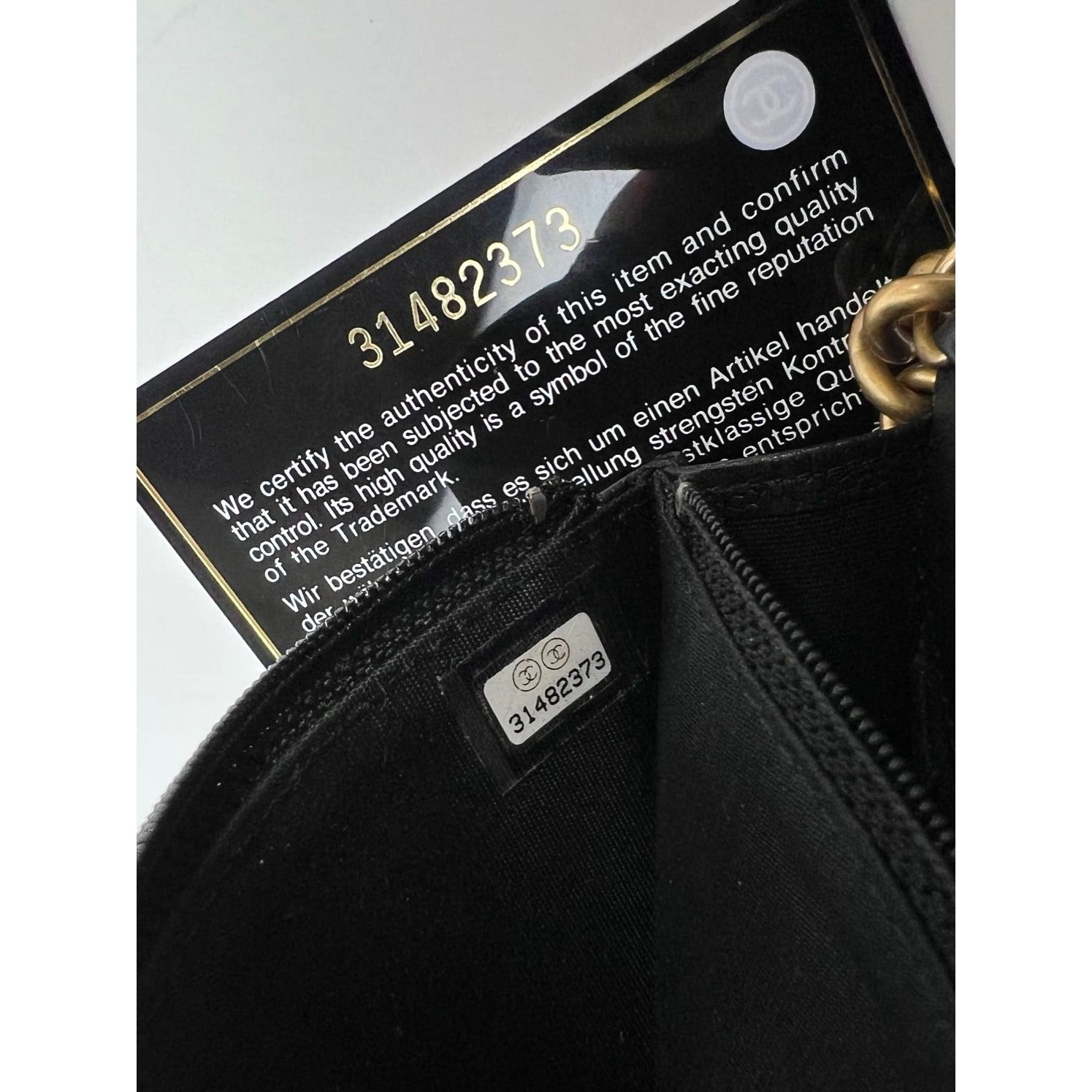 Chanel Caviar Quilted Mini Boy Clutch Wallet on a Chain Black