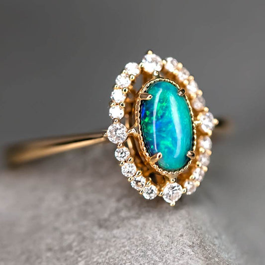 Engagement Ring: Australian Black Opal and Diamond in 18K Yellow Gold
