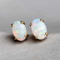 Oval Shaped Australian Solid Opal Stud Earrings 14K Yellow Gold